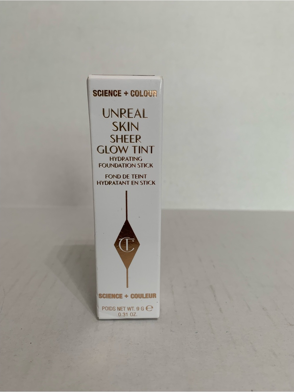 Charlotte Tilbury unreal skin sheer glow tint 11 Tan